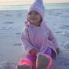 STRIPE EARFLAP WITH MONOGRAM BOWS AND POMPOM