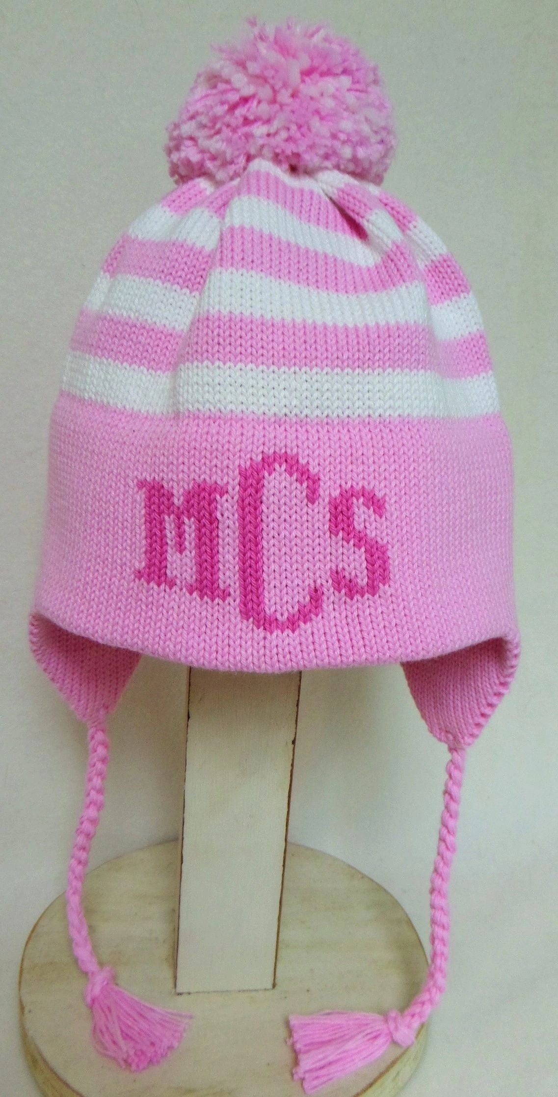 STRIPE EARFLAP WITH MONOGRAM AND POMPOM